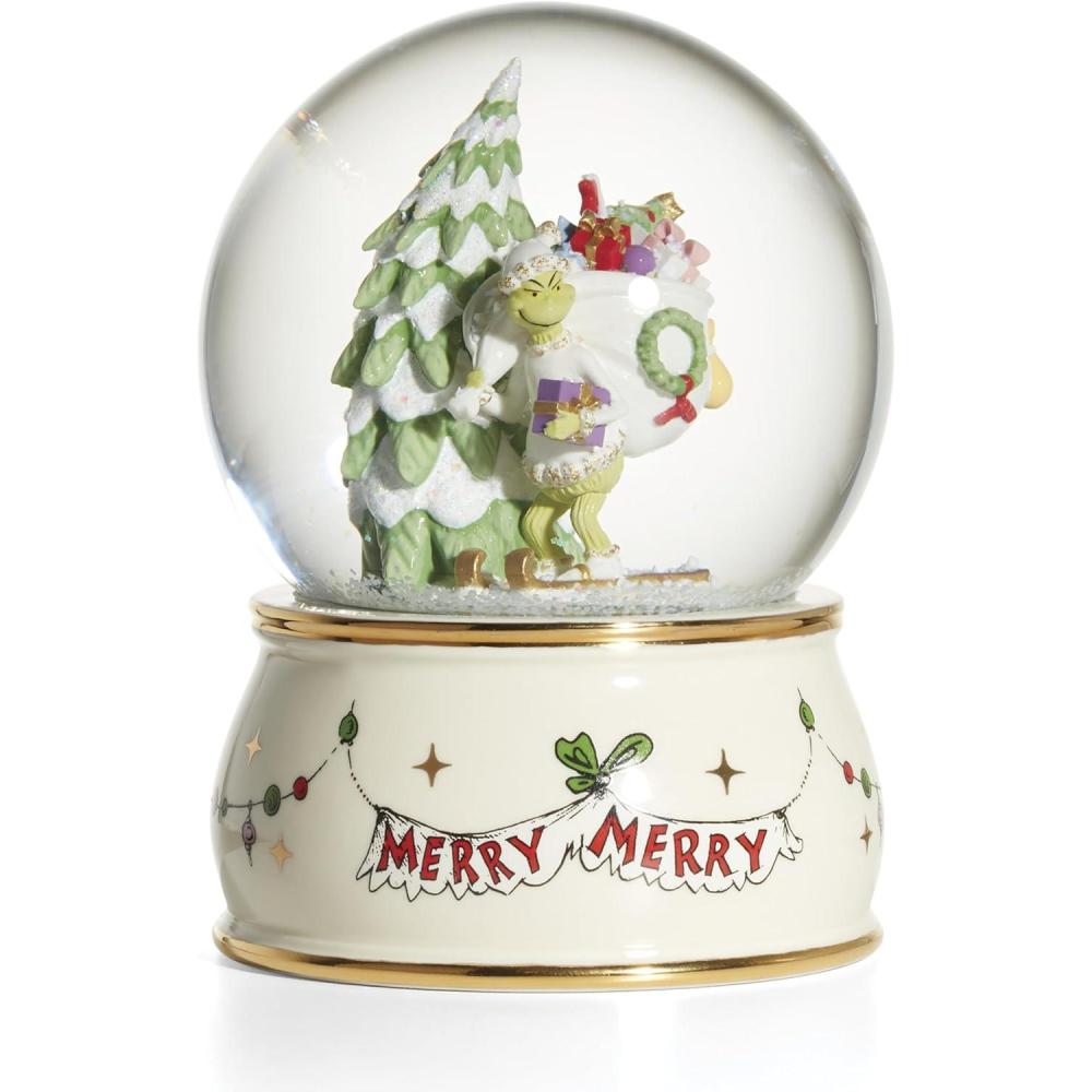imageLenox The Grinch Snow Globe White Porcelain with 24K Gold Accents Grinch Christmas Decorations Indoor Grinch in Santa Hat Near Christmas Tree Living Room Decor for Home Perfect for Christmas